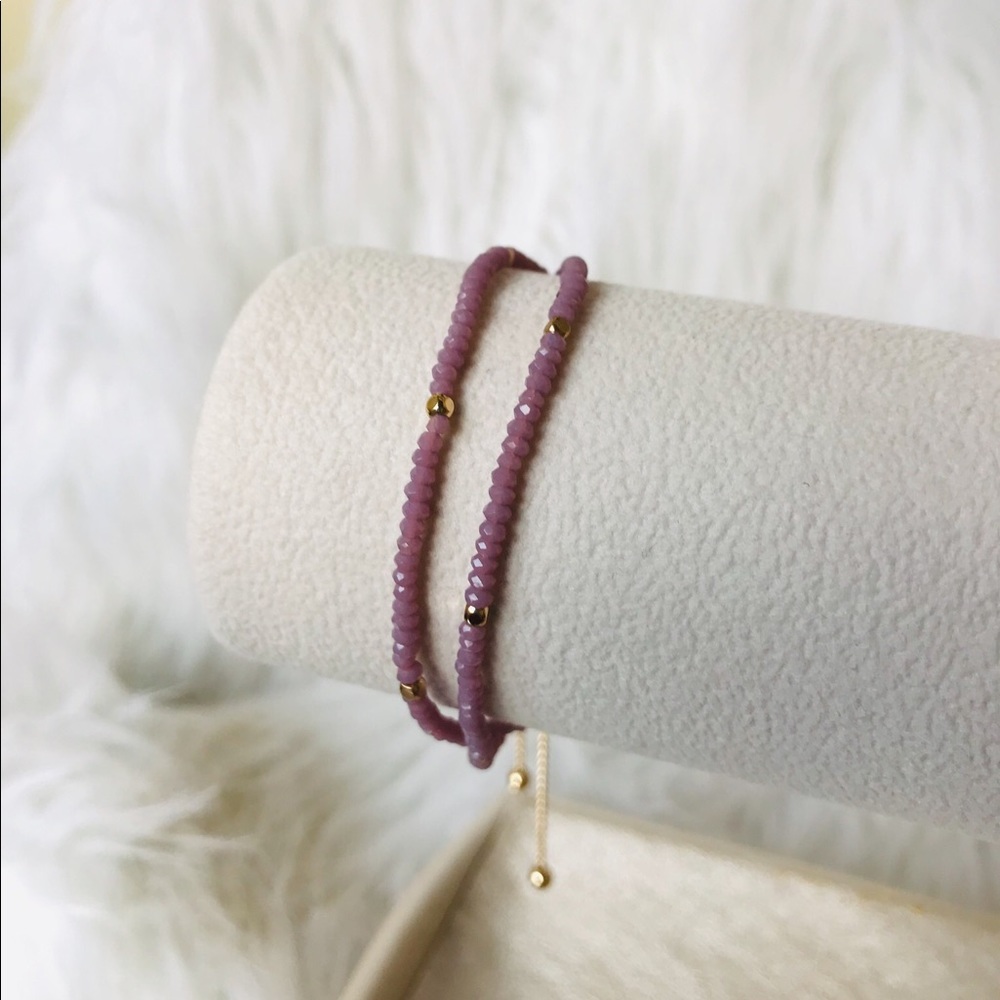2 layered purple beaded bracelet.